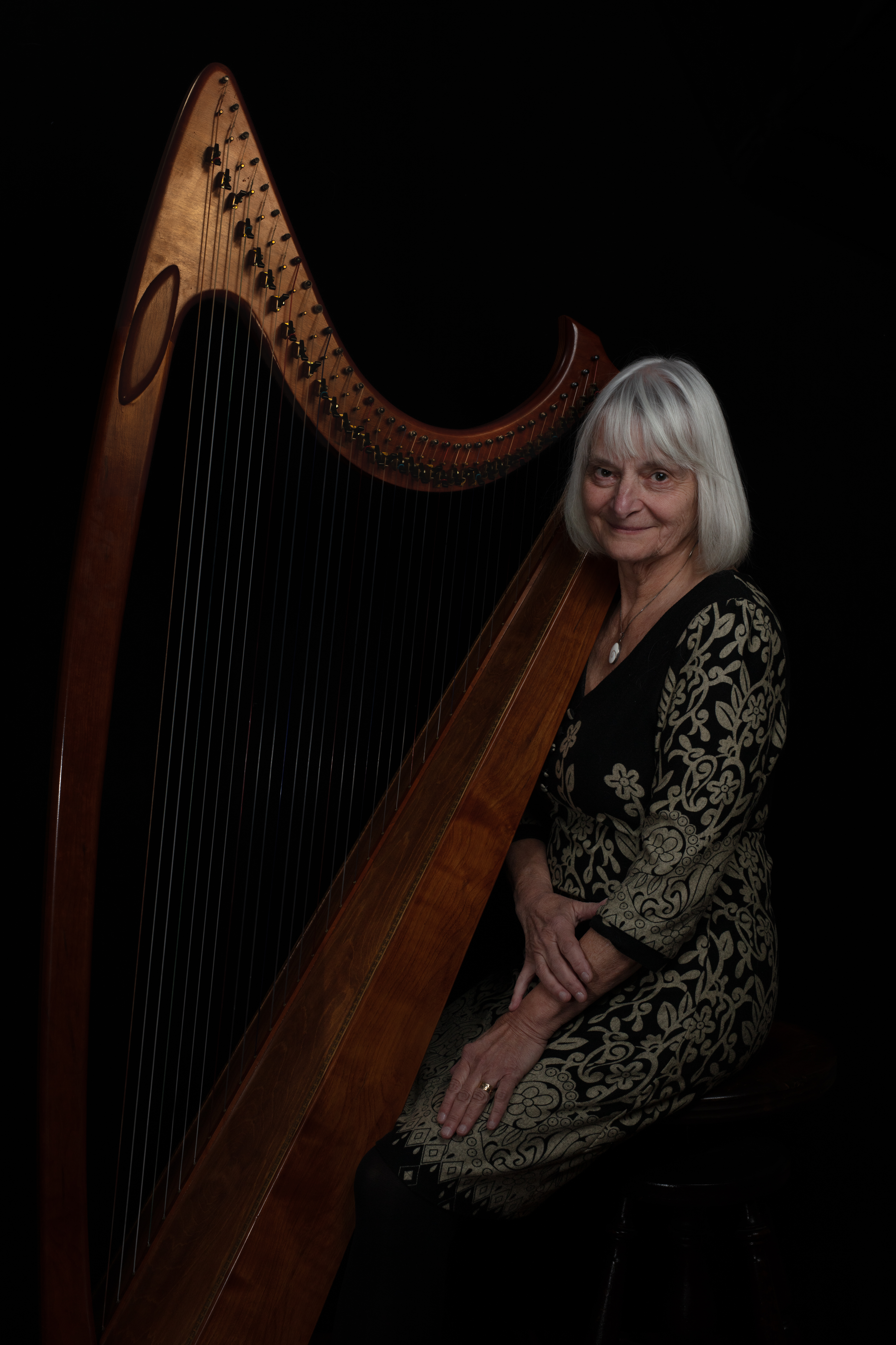 Marilyn playing the harp